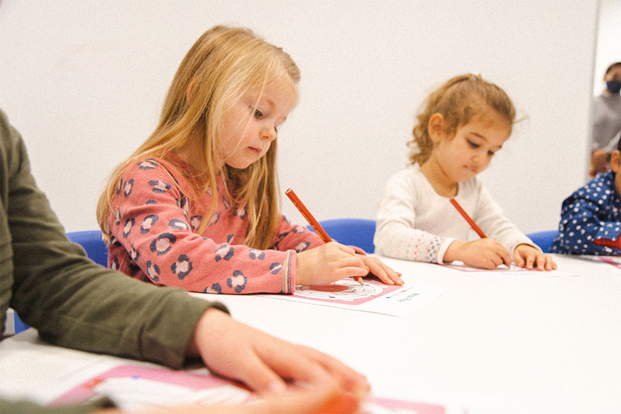 preschoolers in a class completing mazes