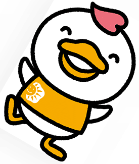 The Shichida duck- Shichi Duck, dressed in orange, smiling