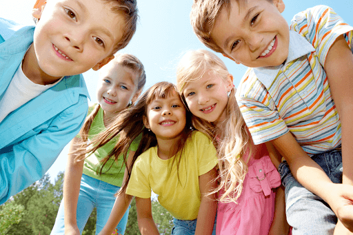A young group of friends looking happy together