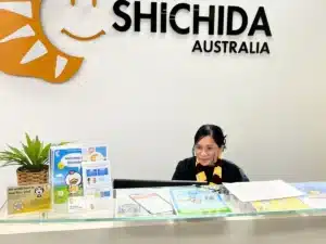 Welcome to Parramatta Shichida, here we see a busy Shichida admin lady sitting behind her desk