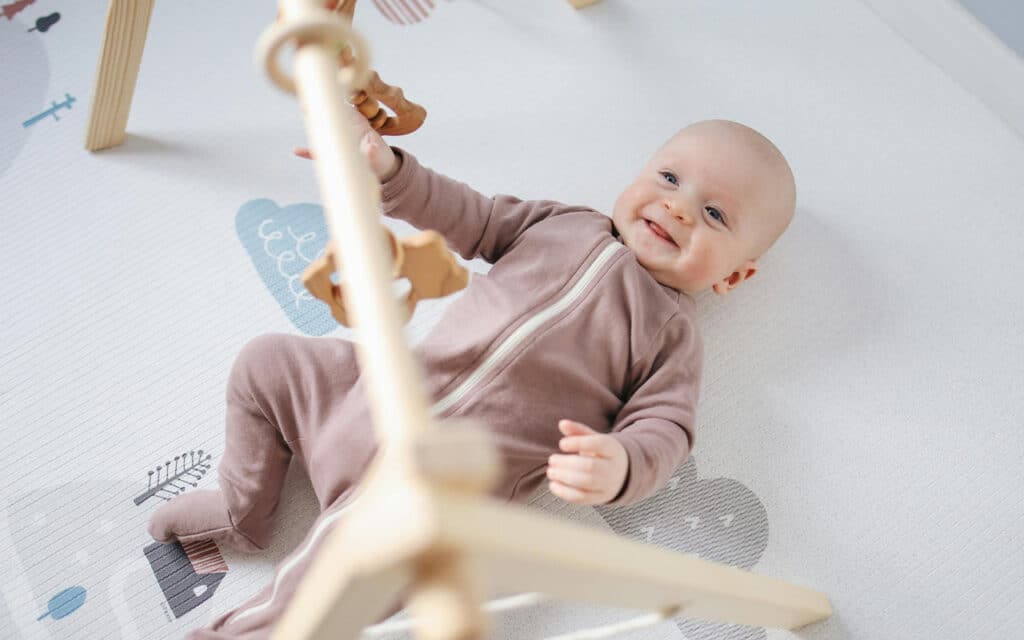 A happy baby. Baby Brain Development happens rapidly during the early years