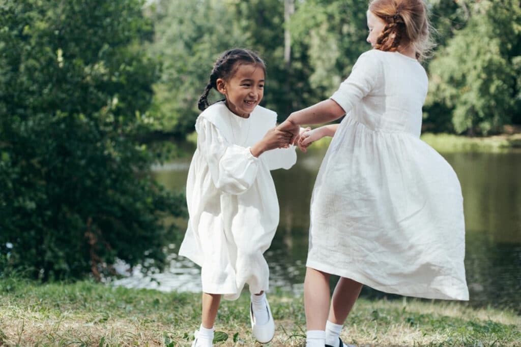 Emotional Intelligence - children playing together while laughing, clearly getting along well!