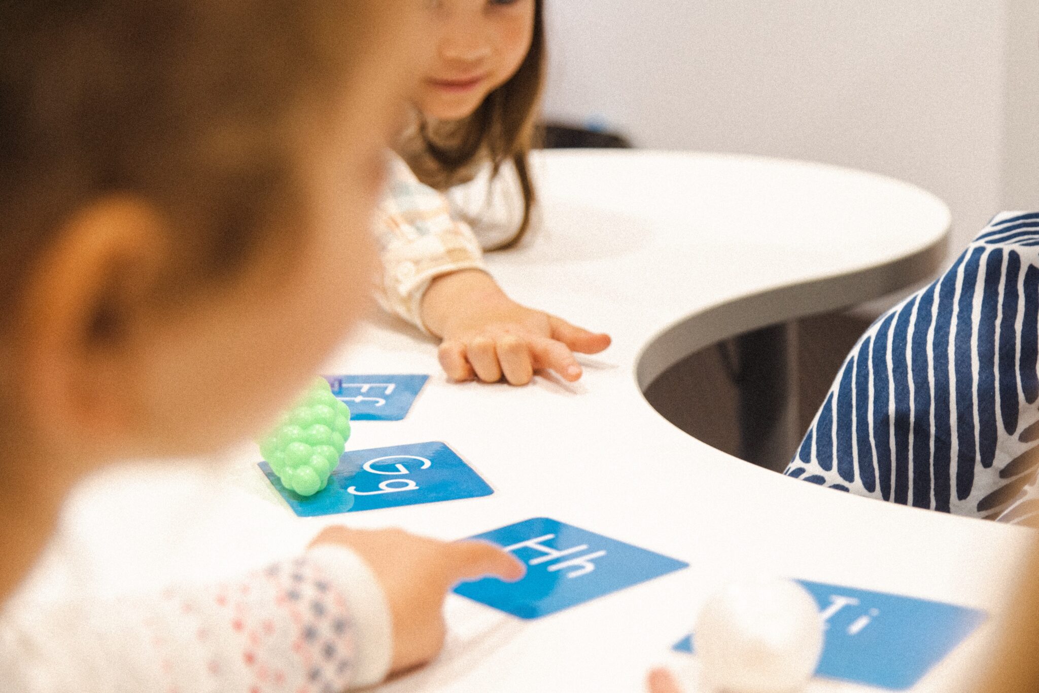 Kids doing a fun phonics game in a Shichida Method class