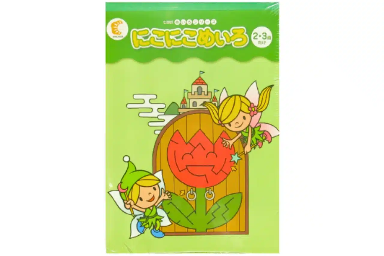 A book featuring an illustration of a fairy sitting on a flower, surrounded by vibrant colors and whimsical details