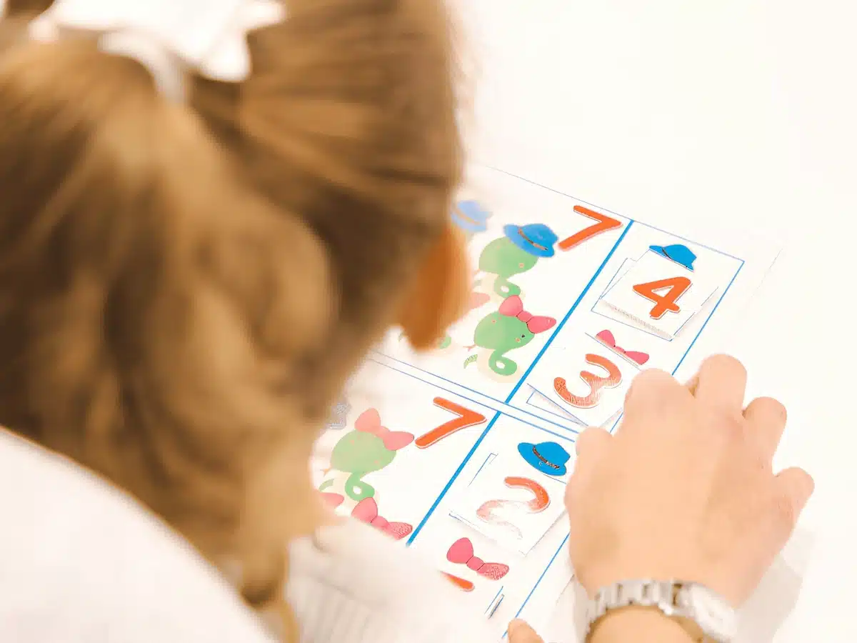 Numeracy Activities for preschool children - A preschooler completing a math number game
