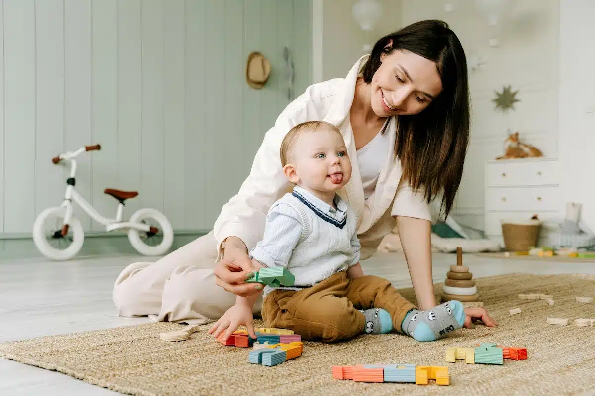 Parent and child enjoying fun motor skill games at home