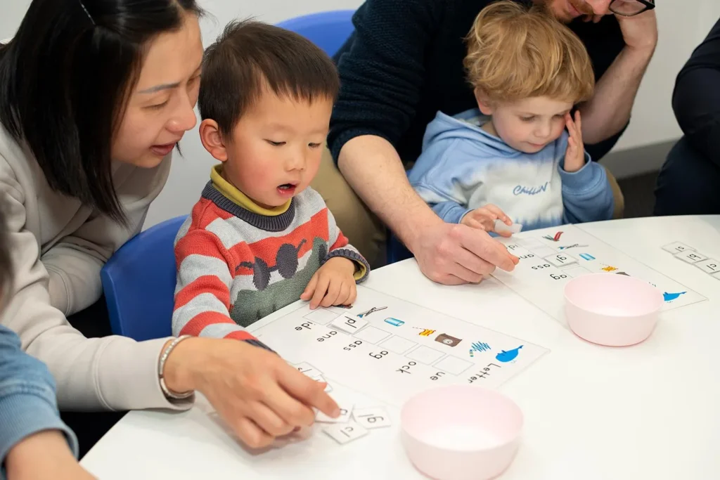 children-learning-with-adult
